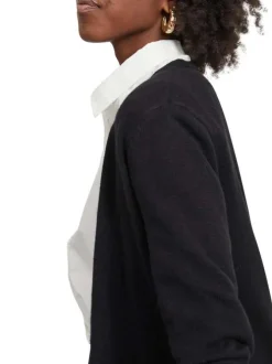 Gilet noir col v longueur mi-cuisse et poches plaquées à l'avant