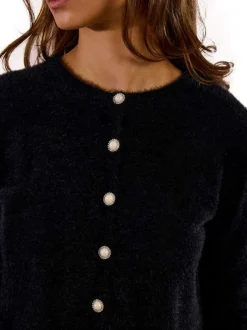 Gilet noir en maille fine avec une coupe droite et des manches longues