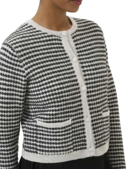 Gilet noir et blanc en maille avec une coupe droite et des manches longues