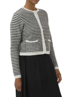 Gilet noir et blanc en maille avec une coupe droite et des manches longues