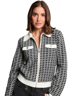 Gilet noir et blanc à motifs avec une coupe droite et un col à revers