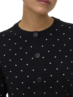 Gilet noir à pois blancs avec boutonnière à l'avant et col rond