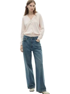 Gilet rose uni avec une coupe droite à col v et des manches longues