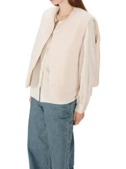 Gilet réversible en coton écru en velours avec une coupe droite et un col rond
