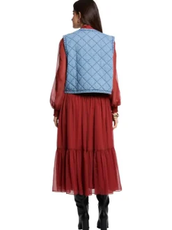 Gilet sans manche en coton bleu à coupe droite pourvu d'une fermeture boutonnée