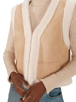Gilet sans manches écru uni avec une coupe droite et un col v