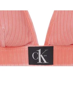Haut de maillot de bain corail à rayures texturées verticales et logo noir