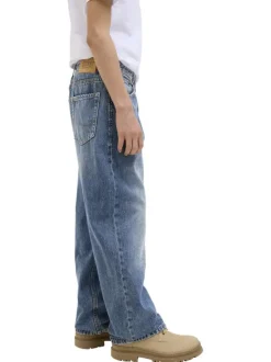 Jean en coton bleu à coupe droite pourvu de coutures contrastées