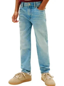 Jean en coton bleu aspect délavé à coupe droite pourvu de poches