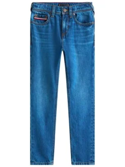 Jean en coton indigo coupe slim avec le patch de la marque à l'arrière