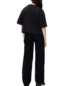 Jean en coton noir uni à coupe large au niveau des jambes et à taille haute