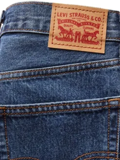 Jean 94 Baggy en coton bleu uni avec coupe droite et surpiqûres orange