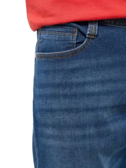 Jean bleu effet délavé en coton mélangé avec une coupe slim et 5 poches