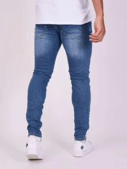Jean bleu en coton effet délavé avec une coupe slim et une taille Intermédiaire