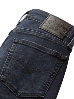 Jean 725™ bleu nuit à coupe droite avec un jacron noir à l'arrière