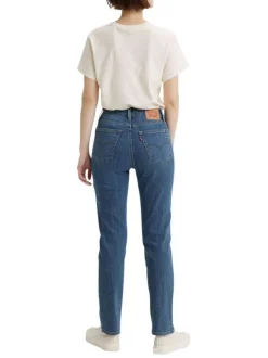 Jean 724 bleu uni avec une coupe slim une taille haute et des passants