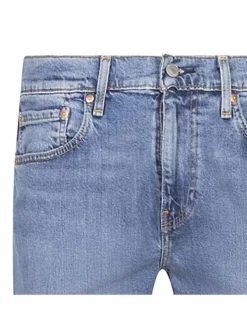 Jean 512 bleu uni en coton mélangé avec une coupe slim et un patch