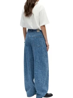 Jean bleu uni pourvu d'une coupe bootcut et d'un taille intermédiaire