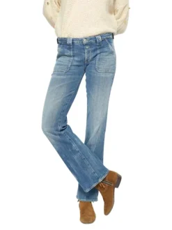 Jean bootcut travaillé en coton stretch bleu délavé à pierres turquoises et jambes évasées