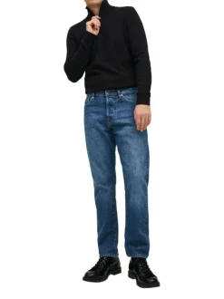 Jean Chris en coton mélangé indigo avec une coupe regular et patch à l'arrière