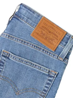 Jean 721 coupe kinny en coton mélangé bleu pourvu de coutures contrastées