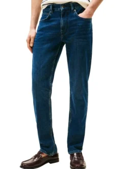 Jean Denton en coton indigo coupe droite avec un patch de la marque à l'arrière