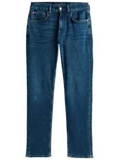 Jean Denton en coton indigo coupe droite avec un patch de la marque à l'arrière