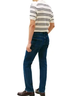 Jean Denton en coton indigo coupe droite avec un patch de la marque à l'arrière