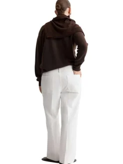 Jean en coton blanc uni pourvu d'une coupe bootcut et d'une taille haute