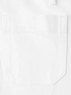 Jean en coton blanc uni pourvu d'une coupe bootcut et d'une taille haute