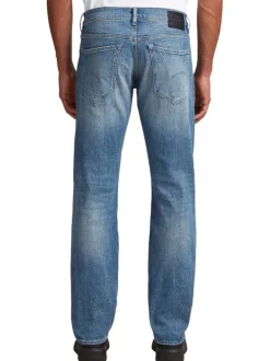 Jean en coton bleu avec une coupe droite et des passants à la taille