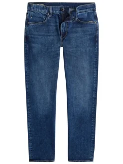 Jean en coton bleu avec une coupe droite et des passants pour ceinture
