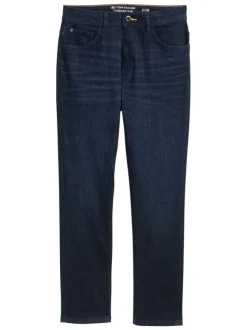 Jean en coton bleu brut légèrement délavé avec une coupe slim