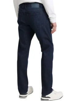 Jean en coton bleu brut légèrement délavé avec une coupe slim