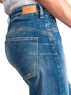 Jean en coton bleu coupe wide leg pourvu d'une fermeture par zip et bouton