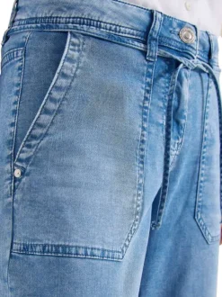 Jean en coton bleu denim pourvu d'une ceinture intégrée à nouer