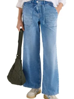 Jean en coton bleu denim pourvu d'une ceinture intégrée à nouer