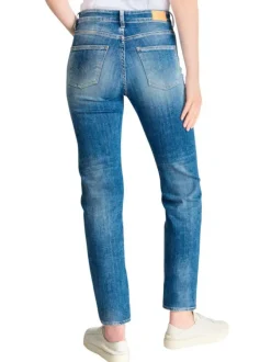 Jean en coton bleu délavé aux cuisses avec une coupe mom et une taille haute