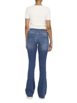 Jean en coton bleu délavé aux cuisses à coupe bootcut et à taille-mi-haute