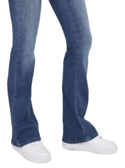 Jean en coton bleu délavé aux cuisses à coupe bootcut et à taille-mi-haute