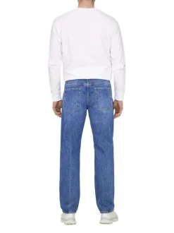 Jean en coton bleu délavé avec une coupe regular fit et une braguette à boutons