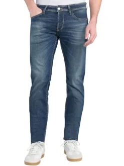 Jean en coton bleu délavé avec une coupe slim et un style 5 poches