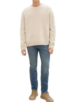 Jean en coton bleu indigo délavé aux cuisses avec une coupe slim fit