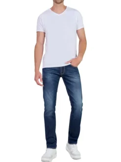 Jean en coton bleu indigo délavé aux genoux avec une coupe slim fit