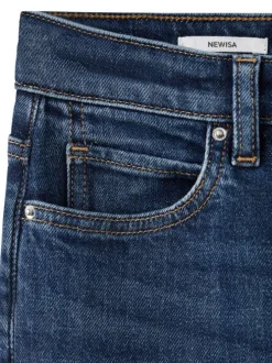 Jean en coton bleu indigo délavé avec une coupe slim et 5 poches