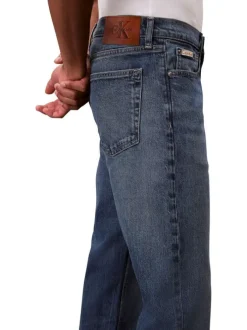 Jean en coton bleu indigo légèrement délavé à coupe regular fit