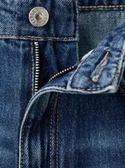 Jean en coton bleu indigo uni avec une coupe droite et 5 poches