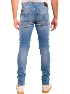 Jean en coton bleu stone délavé aux cuisses avec une coupe skinny