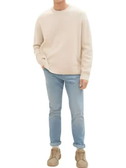 Jean en coton bleu stone délavé aux cuisses avec une coupe slim fit