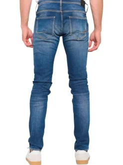Jean en coton bleu stone délavé aux genoux avec une coupe skinny